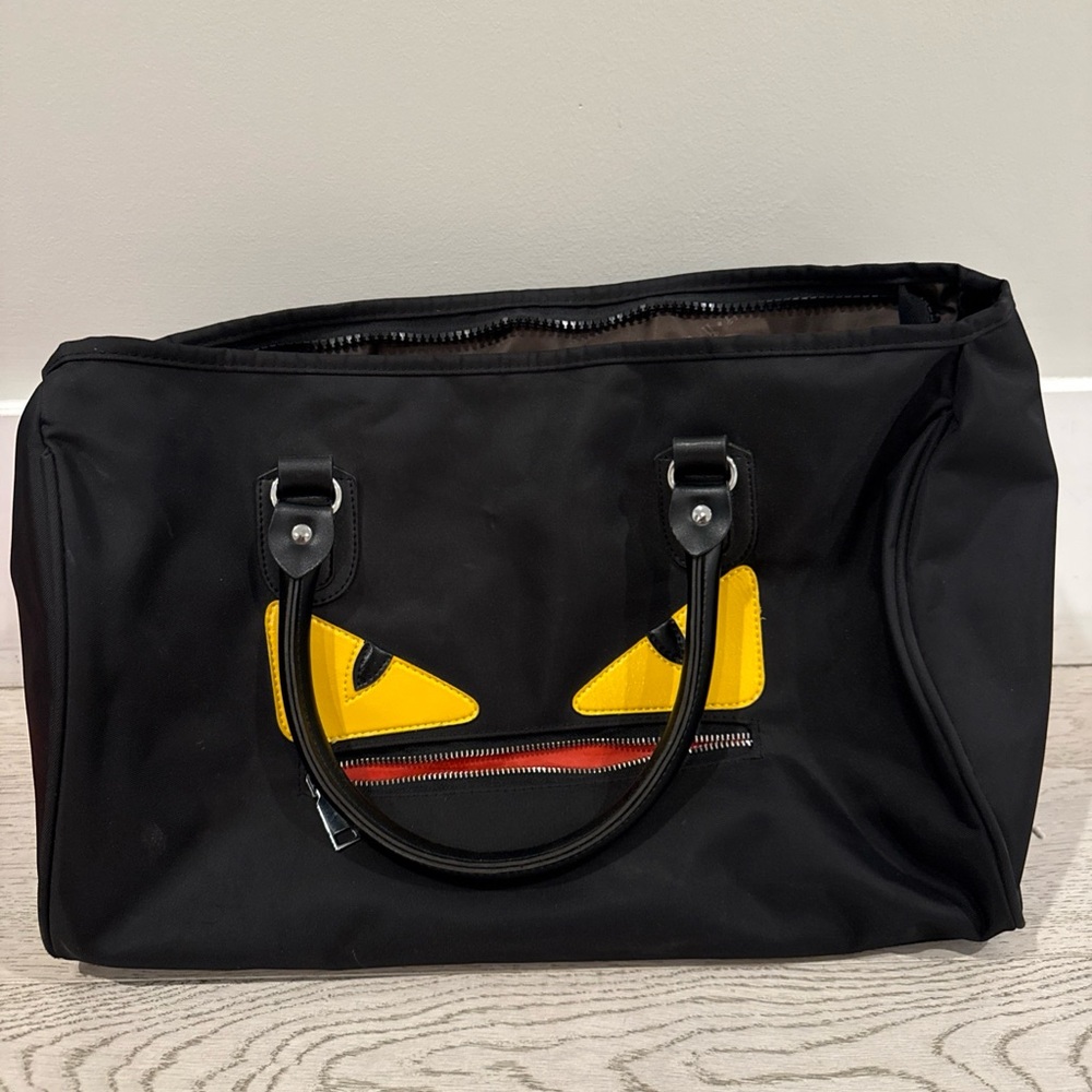 Black Men’s Tote Bag with Yellow Accent Eyes monster eye duffel bag